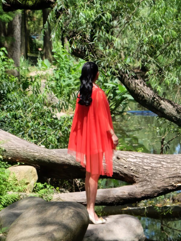 Oversized Pleated Red Tulle Top with Ruffled Neckline and Layered Pearl Necklace - Image 4