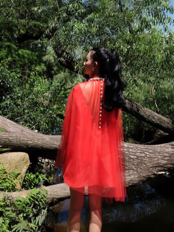 Oversized Pleated Red Tulle Top with Ruffled Neckline and Layered Pearl Necklace - Image 5